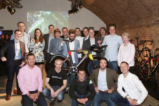 Chris Boardman with the team at Boardman Bikes with the Brownlee Brothers